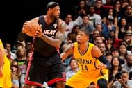 LeBron James #6 of the Miami Heat controls the ball against Paul George #24 of the Indiana Pacers on March 10, 2013 at American Airlines Arena in Miami, Florida.